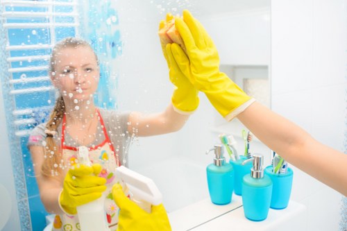 Deep cleaning kitchen cabinets during move in cleaning